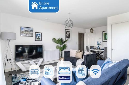 Μια τηλεόραση ή/και κέντρο ψυχαγωγίας στο One and Two Bed Apartments Slough near Heathrow