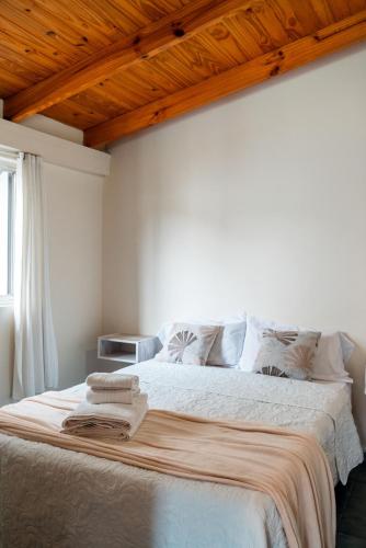 Letto o letti in una camera di Oliva Hostería y Apart