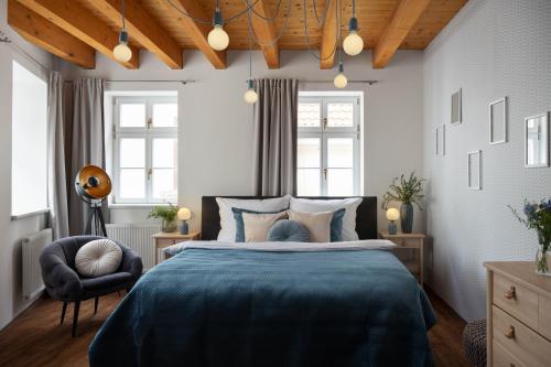 Postel nebo postele na pokoji v ubytování Zelný Trh Boutique Apartments #11 by Goodnite cz