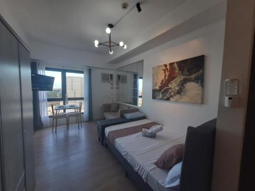 Postel nebo postele na pokoji v ubytování Kwarto Nina