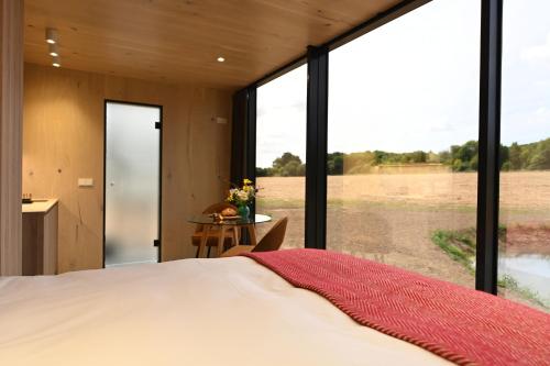 Katil atau katil-katil dalam bilik di Mirror Houses Pound Farm - Pond OOD