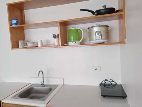 Majoituspaikan Amaia Steps Capitol Condo keittiö tai keittotila