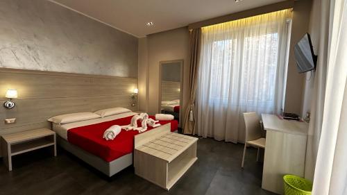 Postel nebo postele na pokoji v ubytování B&B Margherita