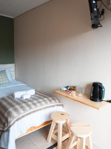 Letto o letti in una camera di Oliva Hostería y Apart