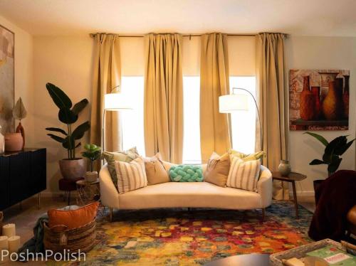 a living room with a couch in front of a window at Luxury Beautiful Spacious Retreat Getaway in Columbus