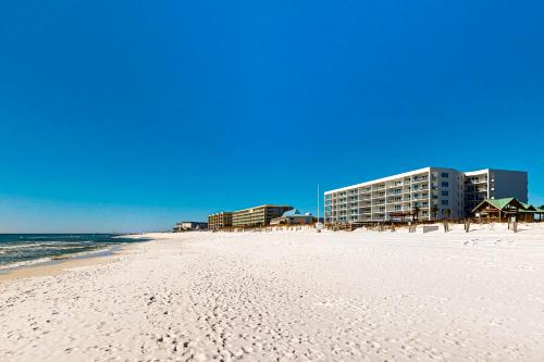 a view of the beach with buildings in the background at Islander W 703 in Fort Walton Beach