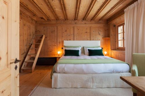 Ένα ή περισσότερα κρεβάτια σε δωμάτιο στο Chalet Ches'Ota La Punt