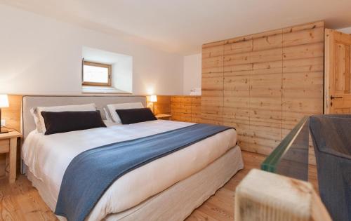 Ένα ή περισσότερα κρεβάτια σε δωμάτιο στο Chalet Ches'Ota La Punt