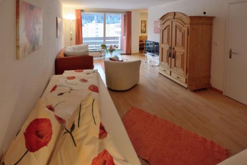 Llit o llits en una habitació de Ferienwohnung St. Moritz