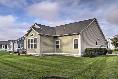 a house with a green lawn in front of it at Great for Groups Bayside Resort Home with Patio in Selbyville