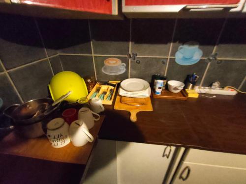 a small kitchen with a counter top with a sink at Good and Nice Room in the Nice Place in Butzbach