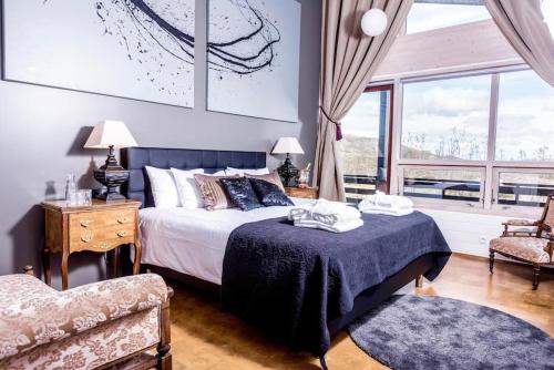 Ένα ή περισσότερα κρεβάτια σε δωμάτιο στο Luxury Lodge, 10 Bdr, Spa, Gym and Game Room