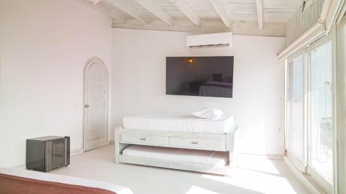 TV a/nebo společenská místnost v ubytování Wala beach club