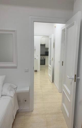 Ένα ή περισσότερα κρεβάτια σε δωμάτιο στο 2 Habitaciones con vistas y 2 Terrazas en Primera Linea Playa Samil