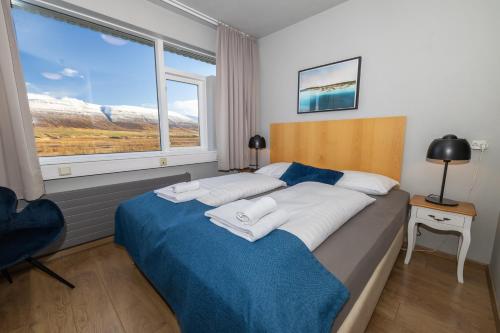 Postel nebo postele na pokoji v ubytování Hotel Kjarnalundur- Aurora Dream - Lodges and Rooms