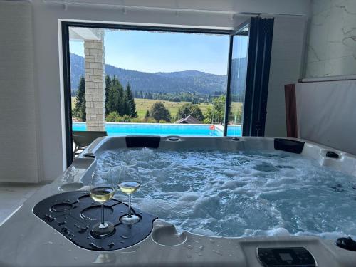 Piscina de la sau aproape de Villa Stella Verde - Wellness Villa with a swimming pool, hot tub and sauna