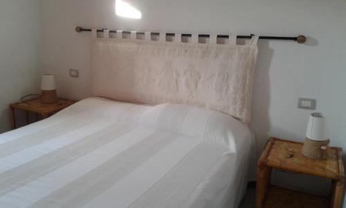 Voodi või voodid majutusasutuse Stazzu Gallurese toas