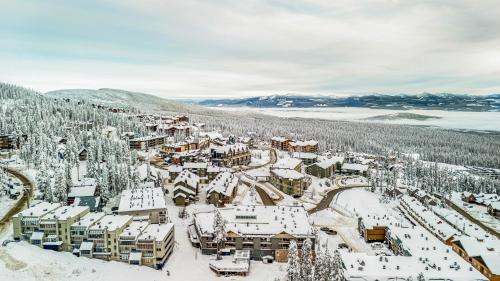 an aerial view of a resort in the snow at Winter Escape On Perfection - Ski In Out, Pool & Hot Tub in Big White