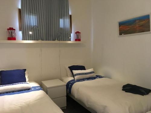 a room with two beds in a room at VILLA DE LA VISTA in Playa Blanca