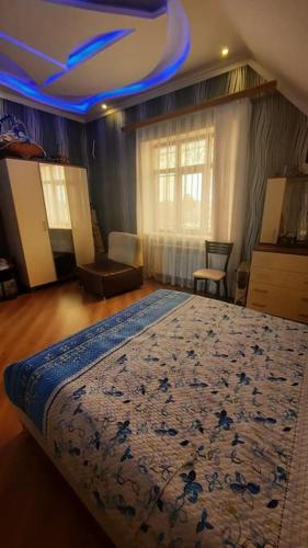 Giường trong phòng chung tại Mayak