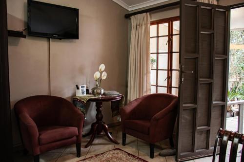 TV a/nebo společenská místnost v ubytování Drakensview Self Catering