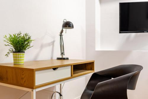 Μια τηλεόραση ή/και κέντρο ψυχαγωγίας στο Orange loft, posibilidad de parking
