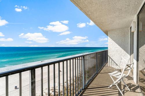 a balcony with a view of the ocean at Sandpiper Beacon Beach Resort in Panama City Beach