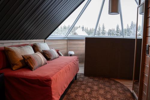 Postel nebo postele na pokoji v ubytování Reindeer Manor Levi