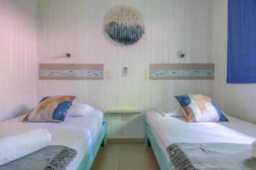 Boho lodge Montezuma l&lにあるベッド