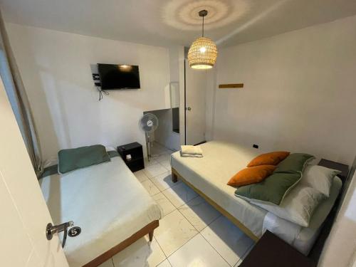 Televisyen dan/atau pusat hiburan di Hostel Killamoon Centro
