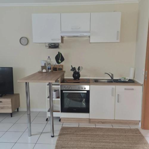 Η κουζίνα ή μικρή κουζίνα στο Ferienwohnung bei Lübeck
