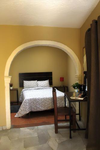 Cama o camas de una habitación en Hotel Camino de Allende