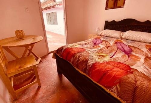 Postel nebo postele na pokoji v ubytování Casa Euforia Hostal San Cristóbal de las Casas