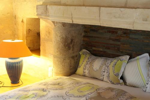 Ένα ή περισσότερα κρεβάτια σε δωμάτιο στο Le Clos de la Garde