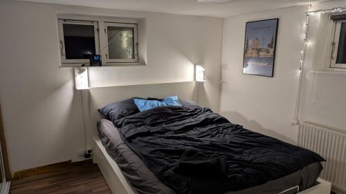 Postel nebo postele na pokoji v ubytování Sleep In Lynge