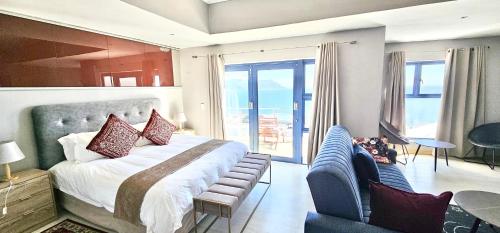 Postel nebo postele na pokoji v ubytování Magellans Hotel
