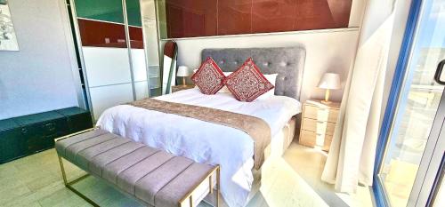 Postel nebo postele na pokoji v ubytování Magellans Hotel