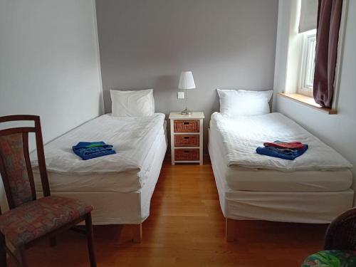 Postel nebo postele na pokoji v ubytování Hóll Guesthouse