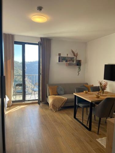 Μια τηλεόραση ή/και κέντρο ψυχαγωγίας στο Apartman Lawa Kopaonik