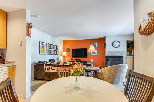 a kitchen and dining room with a table and a living room at Hike, Bike and Fish Brian Head Resort Condo! in Brian Head