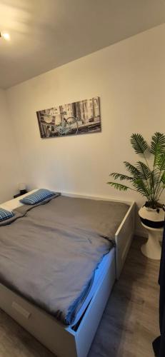 A bed or beds in a room at Apartment Hibiscus