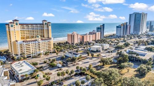 an aerial view of a city and the ocean at Camelot by the Sea in Myrtle Beach