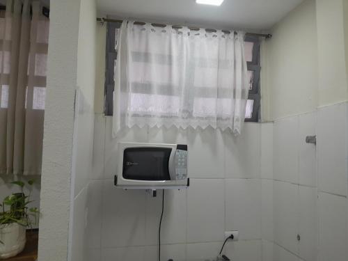 Ένα μπάνιο στο Apartamento Gonzaga