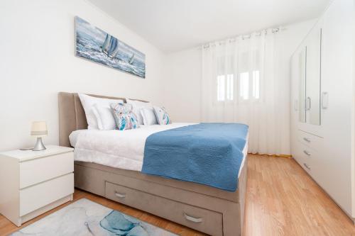 Ένα ή περισσότερα κρεβάτια σε δωμάτιο στο House Cute house with jacuzzi