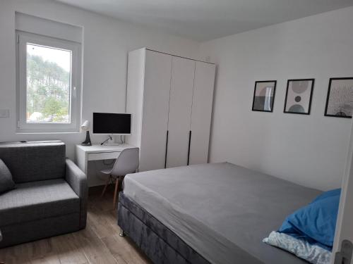 Postel nebo postele na pokoji v ubytování Apartman Vidik Family Divčibare