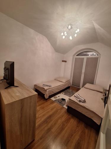 Postel nebo postele na pokoji v ubytování Villa Varzob