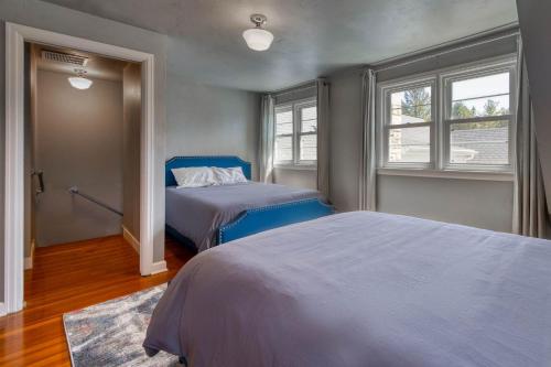 a bedroom with two beds and a window at Westeros by Simple Life Rentals in Ephraim