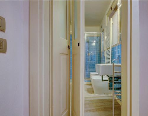 Koupelna v ubytování Golden Lily Lucca- Centro Storico