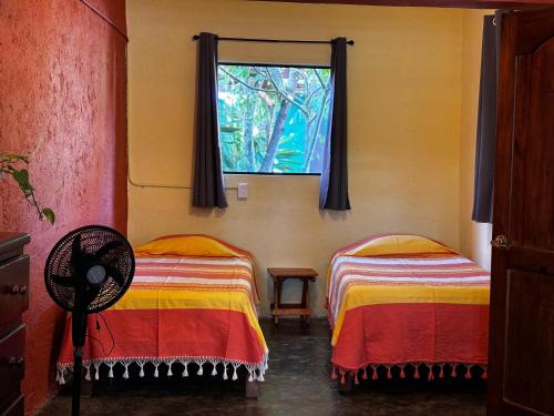 Postel nebo postele na pokoji v ubytování ORidleys Hostel16
