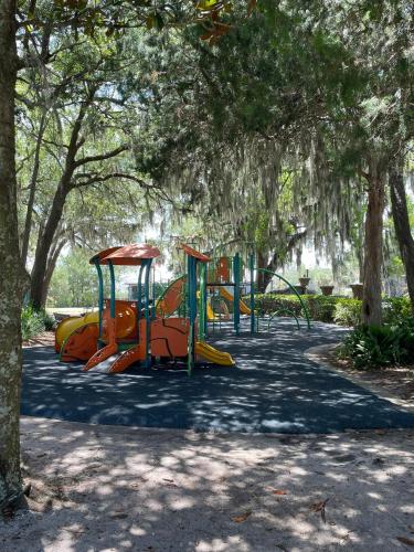 a playground in a park with a bunch of slides at 208 Gunter in Saint Marys
